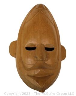 Carved Wooden Tribal Mask.  12" long
