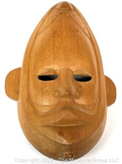 Carved Wooden Tribal Mask.  12" long
