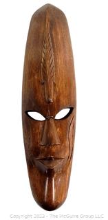 Carved Wooden Tribal Mask.  17" long
