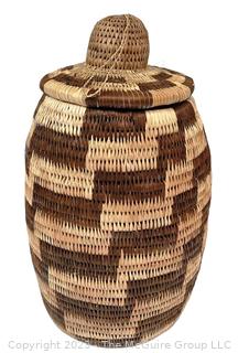 Hand Woven Reed Covered Jar. Made in Botswana. Measures 10" Tall