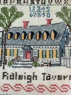 Framed Cross Stitched Embroidered Sampler with Raleigh Tavern Williamsburg VA.  12" x 15"