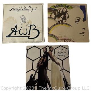 Three (3) Vinyl Record Albums Including Average White Band, A Taste of Honey and WOR FM 98.7 (Solid Gold)