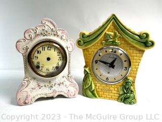 Two (2) Electric Clocks with Porcelain Surrounds. Incomplete Movements
