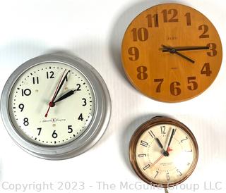 Three (3) Wall Clocks Including Electric and Battery Operated 