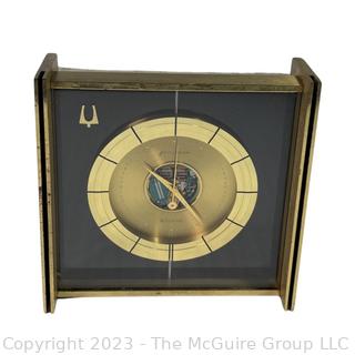 Mid Century 1961 Bulova Accutron Space View Desk Clock. Measures 5.25" square.