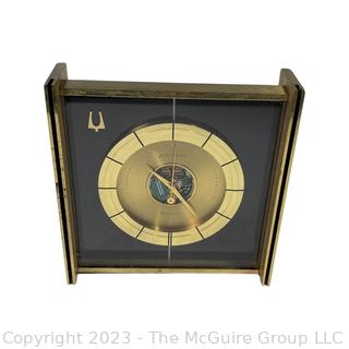 Mid Century 1961 Bulova Accutron Space View Desk Clock. Measures 5.25" square.