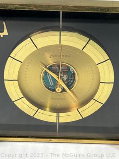 Mid Century 1961 Bulova Accutron Space View Desk Clock. Measures 5.25" square.