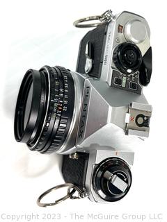 Pentax Film Camera with Multiple Lenses and Light Attachment