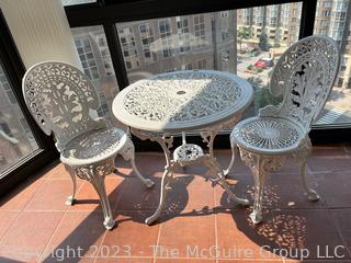 White Three (3) Piece Cast Metal Garden Bistro Set with Cast Table and 2 Chairs.