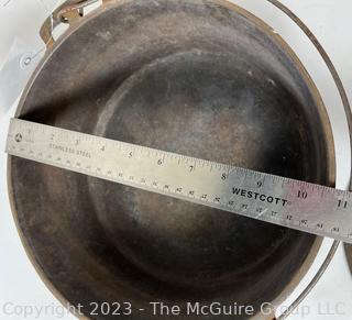 Cast Iron Lidded Cook Pot. Measures 11"W at rim x 4.5"T 