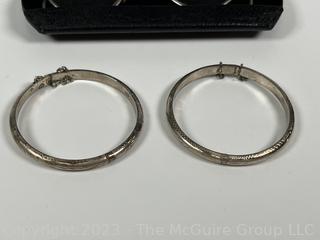 Two (2) Sterling Silver Engraved Bangle Bracelets with Safety Chains and Spectacles in Case. Bracelets weigh 12.6g Total