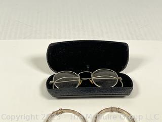 Two (2) Sterling Silver Engraved Bangle Bracelets with Safety Chains and Spectacles in Case. Bracelets weigh 12.6g Total