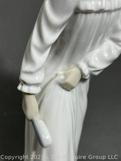 Lladro NAO Porcelain Figurine "Girl Washing Feet". 10.5" Tall