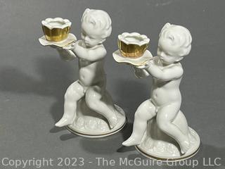 Pair of German Metzler & Ortloff White Porcelain with Gold Decoration Cherub Putti Candlesticks. 5" Tall