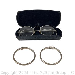 Two (2) Sterling Silver Engraved Bangle Bracelets with Safety Chains and Spectacles in Case. Bracelets weigh 12.6g Total