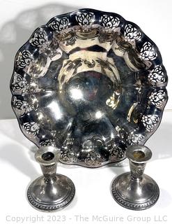 Silver Plate Pierced Serving Bowl and Two Sterling Silver Weighted Candlesticks. 