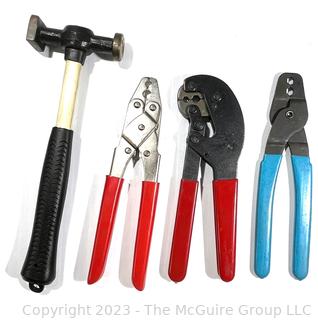 Four (4) tools:  Metal Hammers and  three Crimping Pliers. 