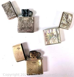 Three (3) Vintage Cigarette Lighters, one gold filled and two Sterling Silver. 