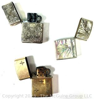 Three (3) Vintage Cigarette Lighters, one gold filled and two Sterling Silver. 