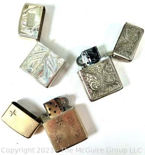 Three (3) Vintage Cigarette Lighters, one gold filled and two Sterling Silver. 