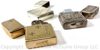 Three (3) Vintage Cigarette Lighters, one gold filled and two Sterling Silver. 