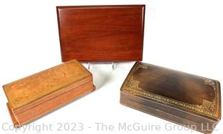 Three (3) Trinket Jewelry Boxes in Leather and Wood. Music box