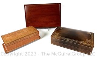 Three (3) Trinket Jewelry Boxes in Leather and Wood. Music box