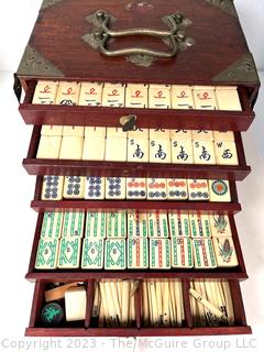 Antique Mah Jong Set with Bone Engraved Tiles On Bamboo Backs and Betting Sticks in Wood Inlaid Case with Drawers and Brass Fixtures