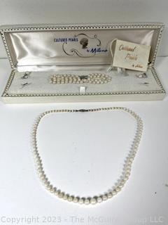 Set of Cultured Pearl Jewelry by Milano Including Graduated Necklace, Triple Strand Bracelet and Screw Back Earring in Box