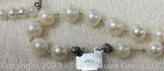 Set of Cultured Pearl Jewelry by Milano Including Graduated Necklace, Triple Strand Bracelet and Screw Back Earring in Box