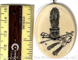 Hand Carved Scrimshaw Pendant with West Point Hat and Swords 