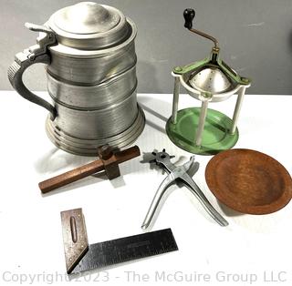 Group of Kitchen Tools Including Leather Punch Pliers, Right-Angle Square, Pewter Tankard and Handy-Andy Juice extractor.