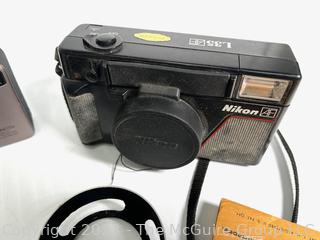 Nikon, Vivitar and Konica  35mm Film Cameras with Light Meter, Flash Attachments and Bulbs (was 0364JT)