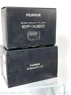 Camera: Like New with Original Boxes Fuji X-Pro 1 Digital 16.3 Mega Pixel Digital Camera w/ F35mm Lens; Extras: EF-X20 flash; Battery/Recharger; XF 18mm F2 Lens; XF 60mm F2.4 R Macro Lens; Manfrotto Mono-Pole, Filter Pack