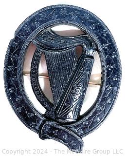 Victorian Round Irish Bog Turf Carved Harp Brooch.