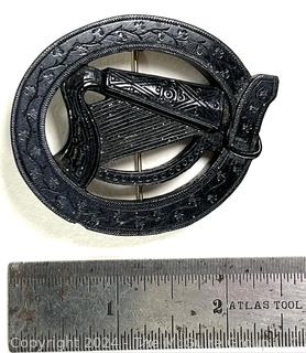 Victorian Round Irish Bog Turf Carved Harp Brooch.