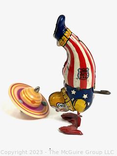 J Chein Clown Handstand Lithograph Tin Windup Toy and Spinning Top