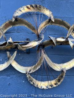 Large Modern Abstract Brutalist Wall Sculpture In Torch Cut Brass, 1970s.  64ʺL × 27ʺH (Note: A wing was broken off as it was handled during the inspection.) Easy fix if so inclined 