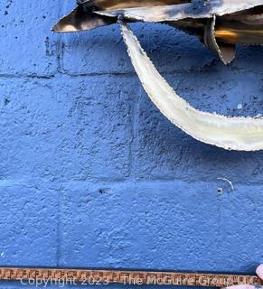 Large Modern Abstract Brutalist Wall Sculpture In Torch Cut Brass, 1970s.  64ʺL × 27ʺH (Note: A wing was broken off as it was handled during the inspection.) Easy fix if so inclined 