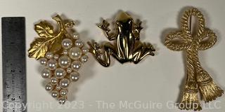 Three (3) Costume Jewelry Brooches Including Two Signed Givenchy.