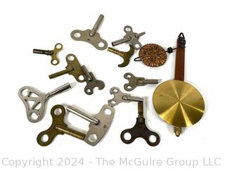 Group of Clock Keys and Pendulum