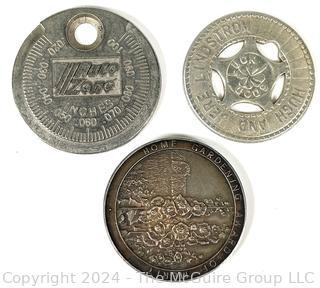 Three (3) Metal Promotional Tokens