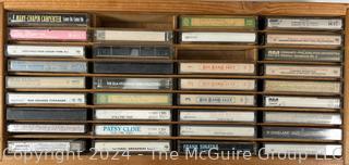 Collection of Vintage Cassette Tapes and Wooden Box