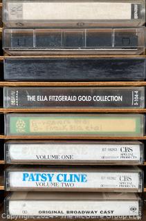 Collection of Vintage Cassette Tapes and Wooden Box