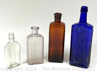 Collection of Four (4) Vintage Glass Bottles