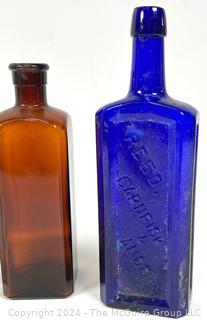 Collection of Four (4) Vintage Glass Bottles