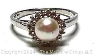 14KT White Gold Pearl Ring with Diamond Surround. 2.8 grams total weight