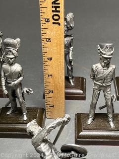 Collection of Six (6) Pewter Soldier Statues. One is off his plinth. 