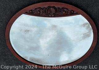 Oval Carved Mirror. 39 x 47"