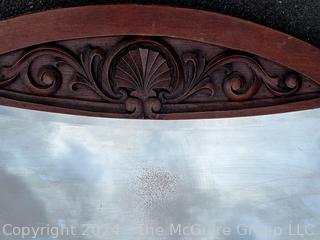 Oval Carved Mirror. 39 x 47"